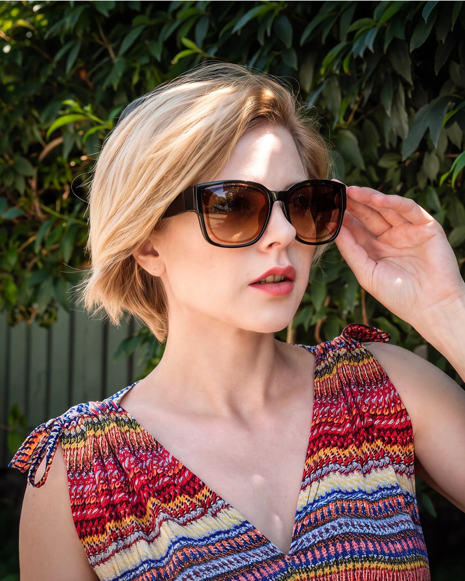 Woman wearing sunglasses outdoors